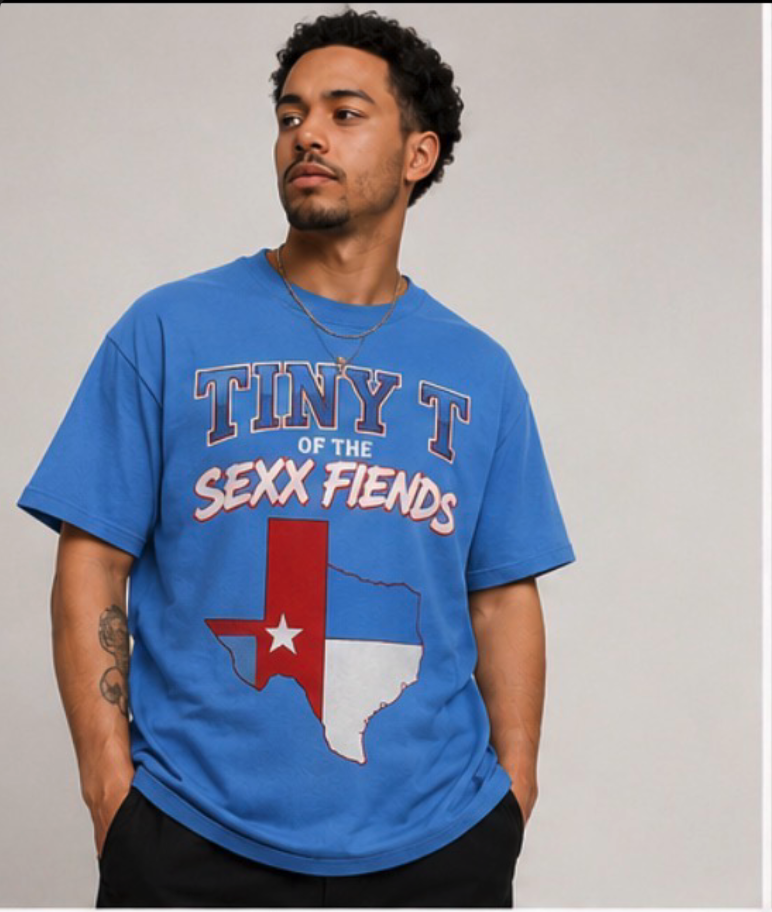 Man wearing the light blue Tiny T Houston collection T-shirt